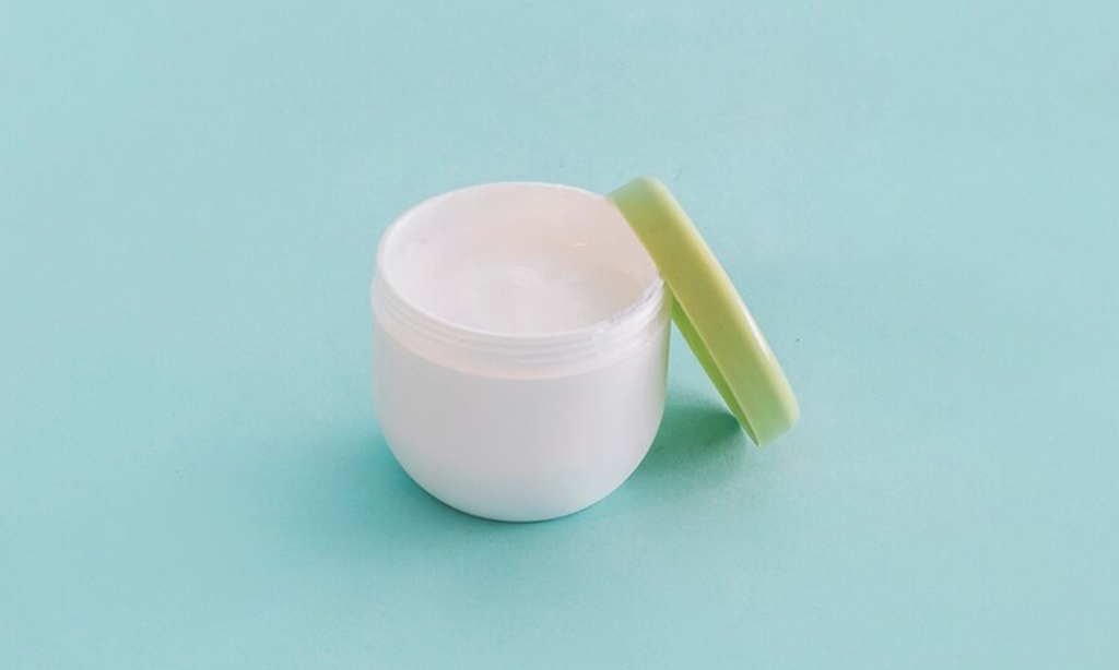 cream box with open cap